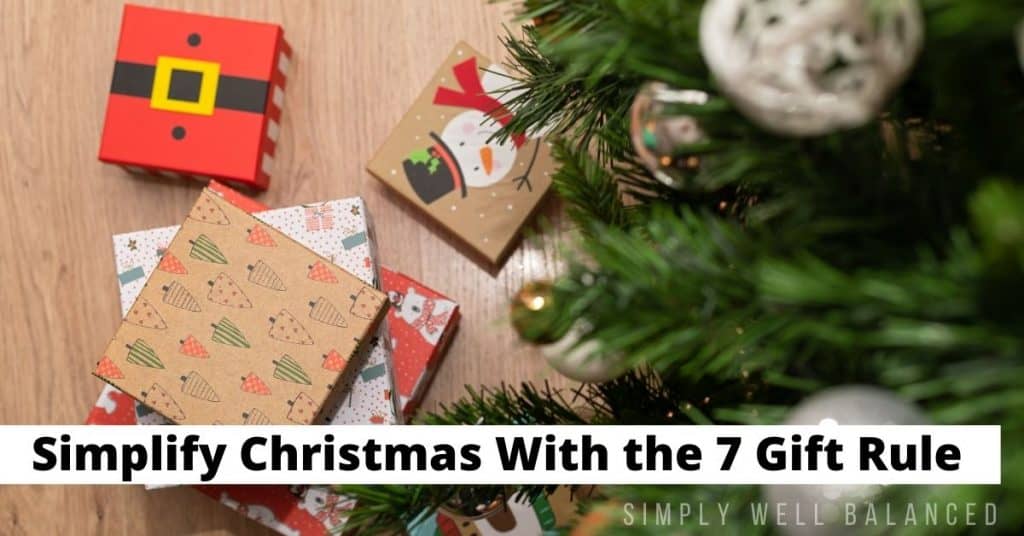 Gifts under Christmas Tree. Text: Simplify Christmas with the 7 gift rule.