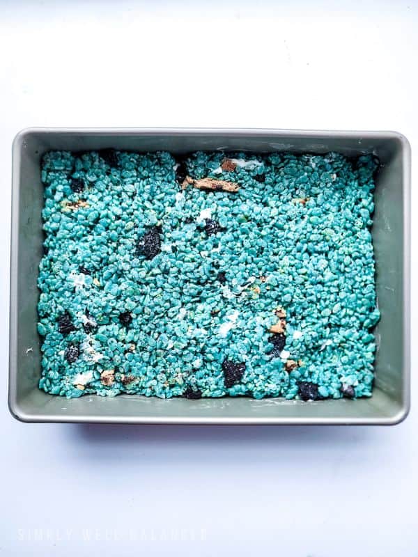 Blue cookie monster rice krispie treats in a pan. 