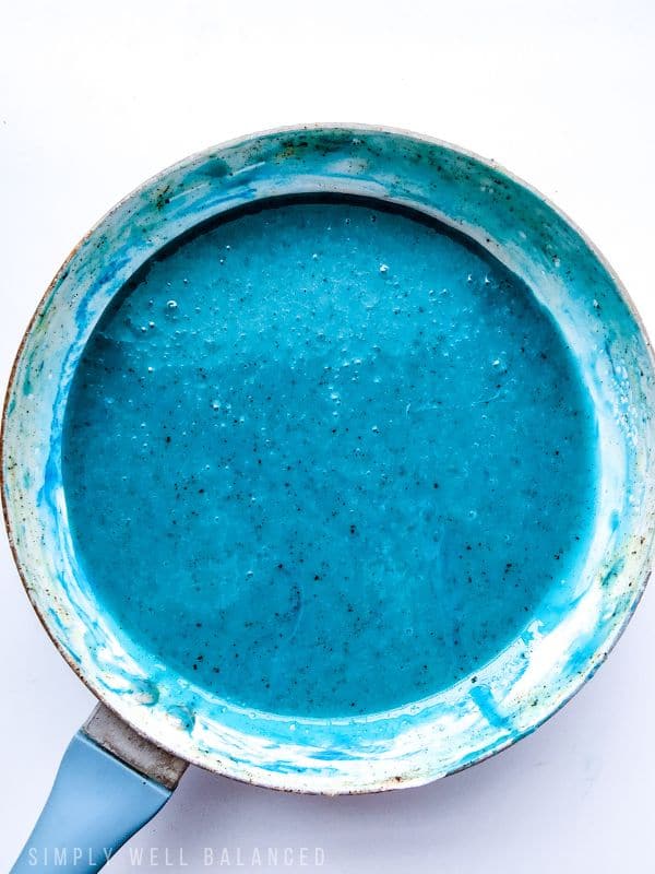 Blue food coloring added to melted butter and marshmallows. 