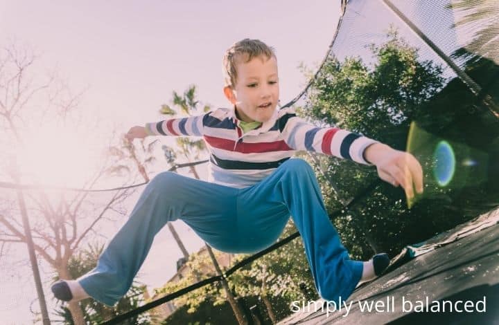 Child jumping on trampoline to calm down.