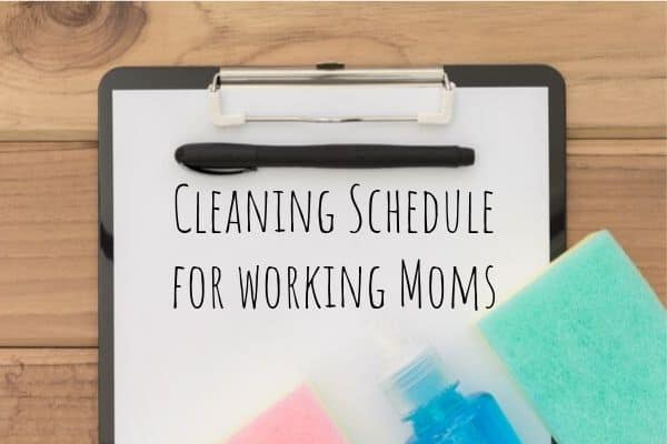 Cleaning Schedule Checklist for working moms on a clipboard