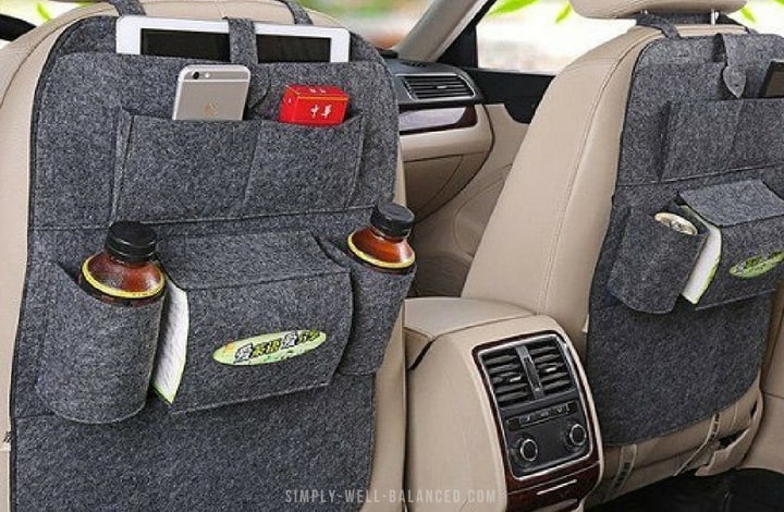 These car organizers strap on to the back of your car's front seat and have storage compartments for everything from tablets to snacks and napkins.