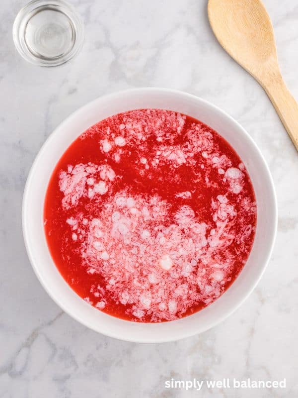 Melted coconut oil added to cold Halloween punch for a spooky effect. 