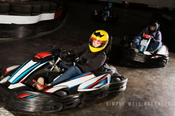 Kids indoor go kart racing at night