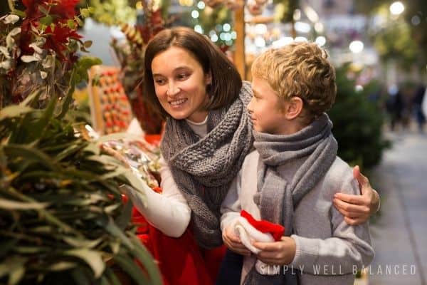 Mother and son date night - shopping at an outdoor market. 