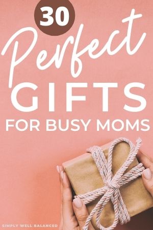 A paper wrapped gift on a pink background with text overlay that reads "30 perfect gifts for busy moms"