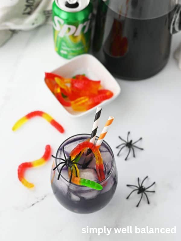 Purple Halloween Mocktail in a glass. 