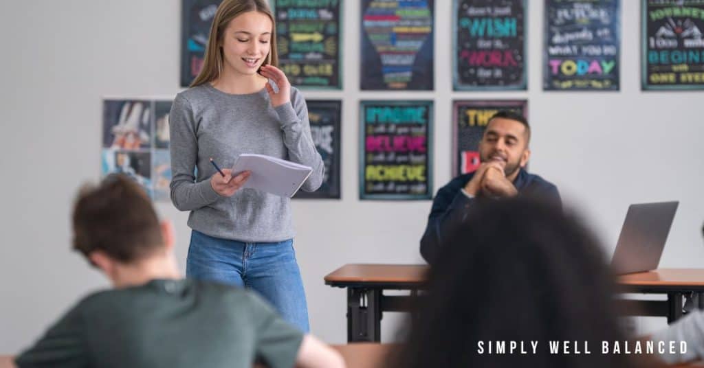 Student speaking in front of class. Communication is an important life skill. 