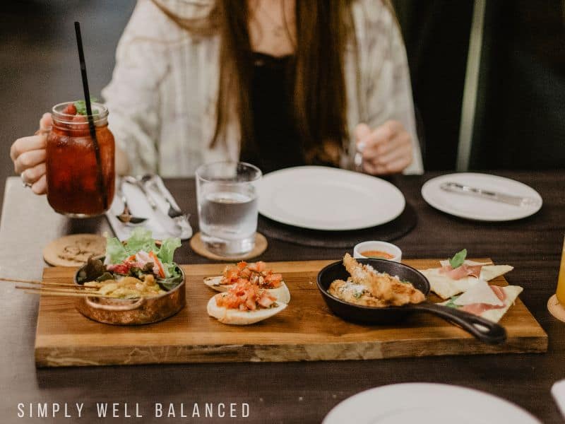 Woman having dinner at a restaurant. 